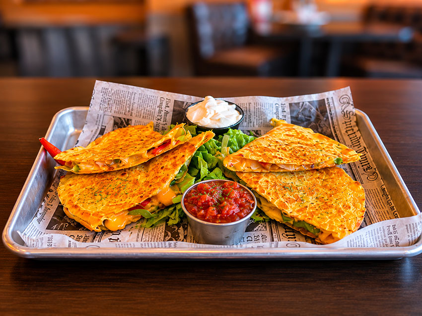 Quesadilla with cheddar jack, peppers, and onions