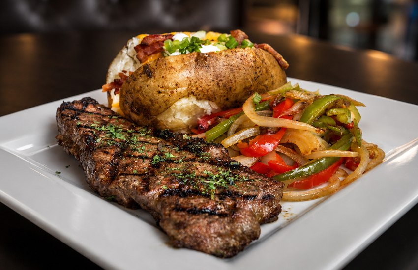 Steak and potato with vegetables